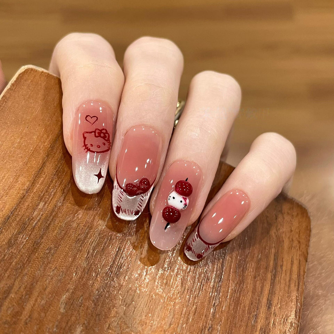 Artificial nails with playful Hello Kitty design Bowlift