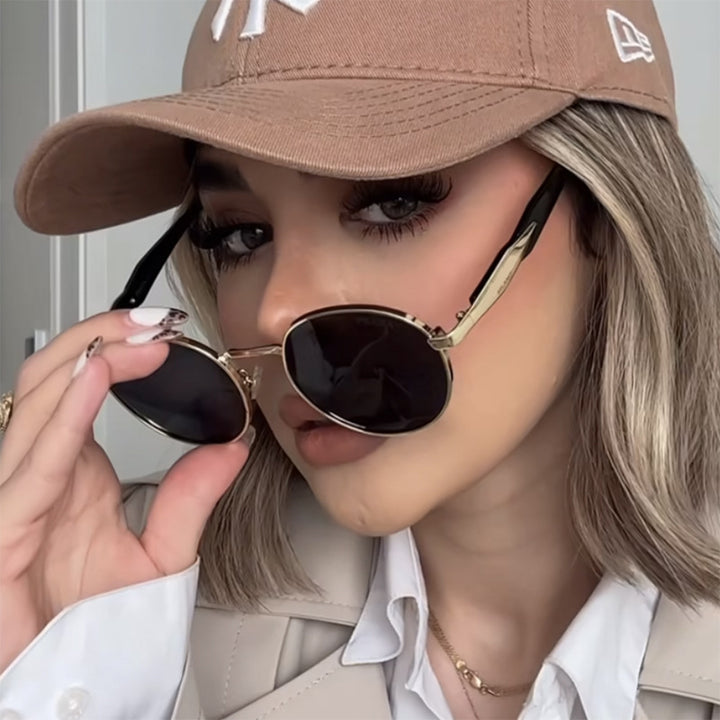 Women's round sunglasses with elegant, golden frame and UV protection Bowlift