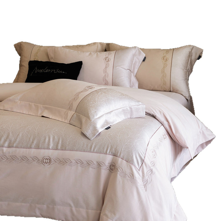 Bedding set made of cotton satin with embossed leaf structure and embroidered border
