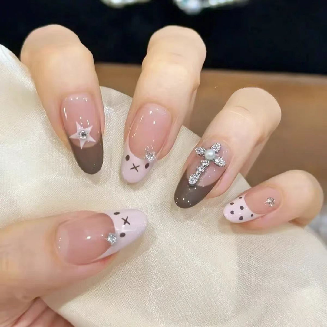 Artificial nails with creative design and sparkling accents Bowlift