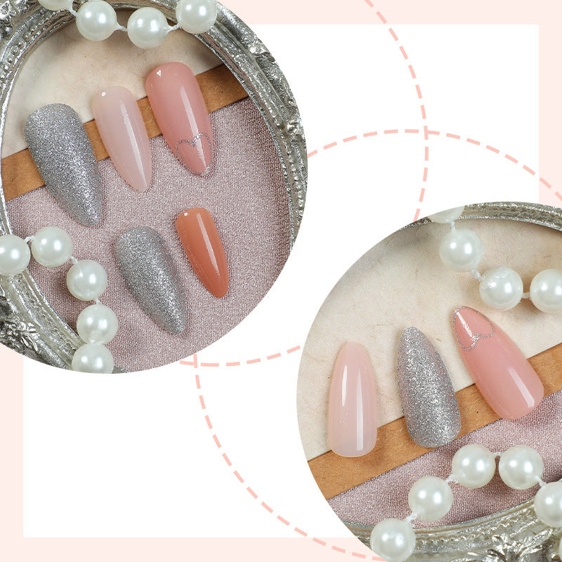 Acrylic nail set with heart and glitter design Bowlift