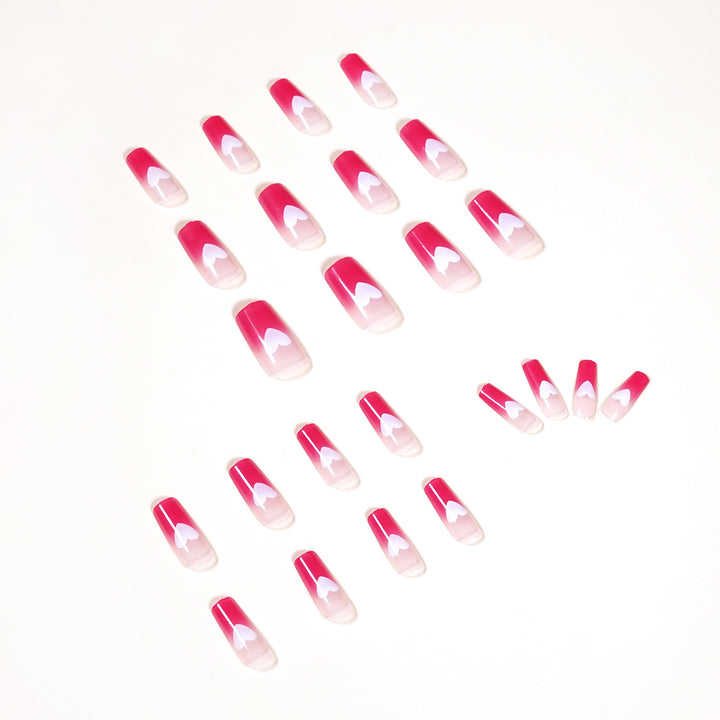 Artful nail extensions in romantic heart design Bowlift