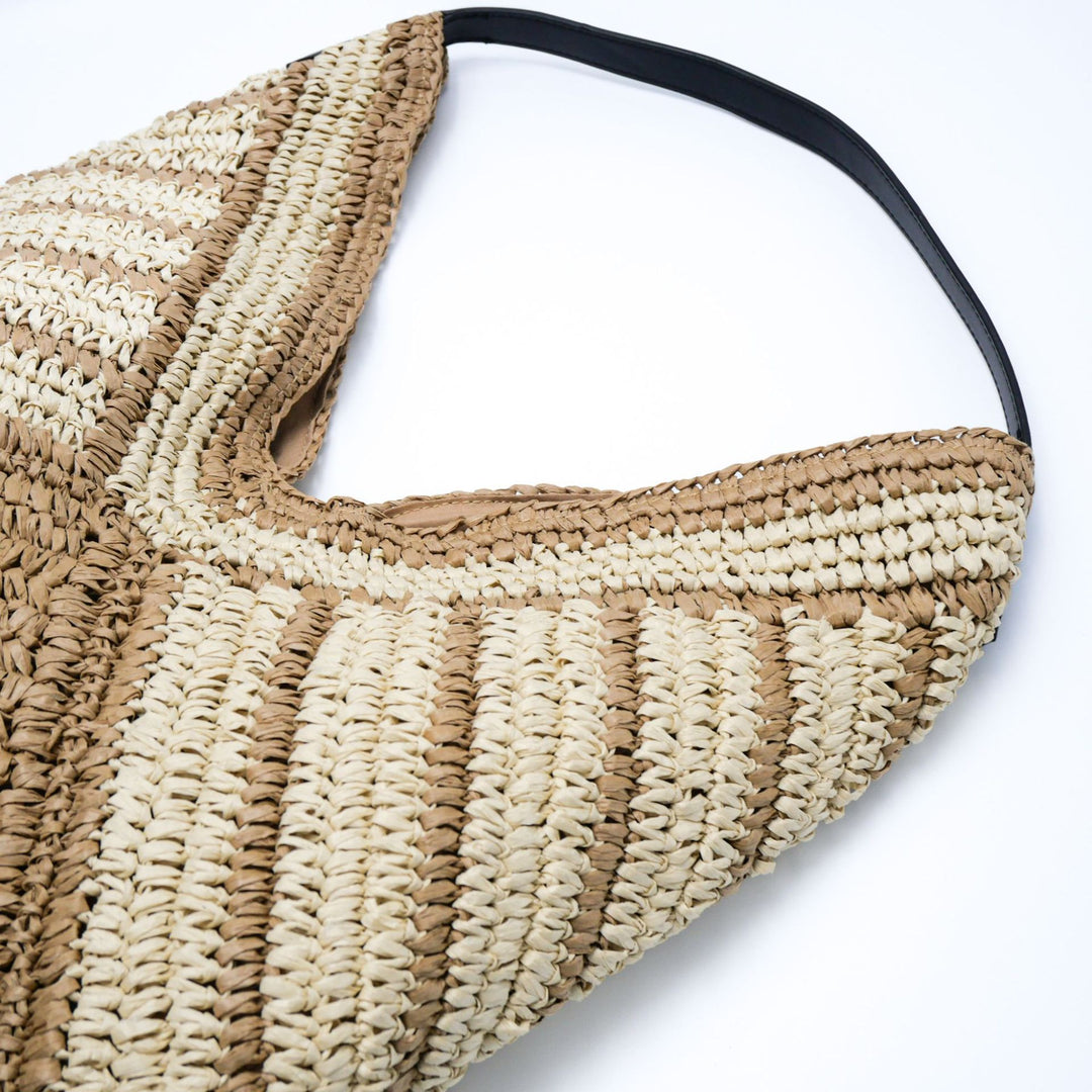 Leisure bag made of braided natural material Bowlift