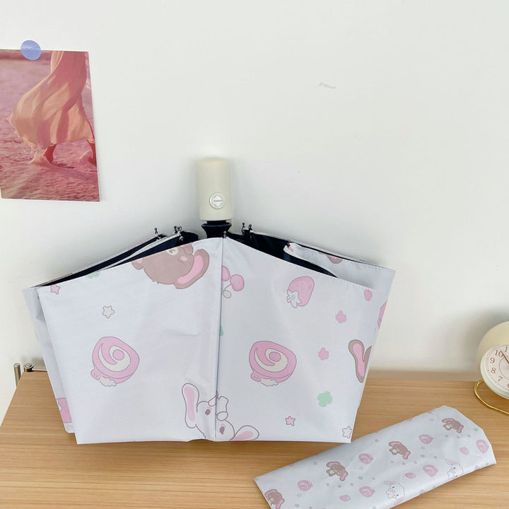 Women's Automatic Folding Umbrella with Playful Animal Design Bowlift