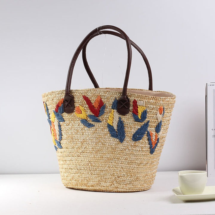 Braided beach bag with colorful embroidery pattern Bowlift
