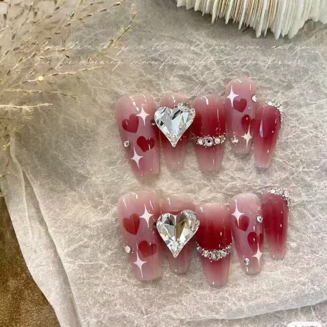 Artificial nails in romantic heart design Bowlift