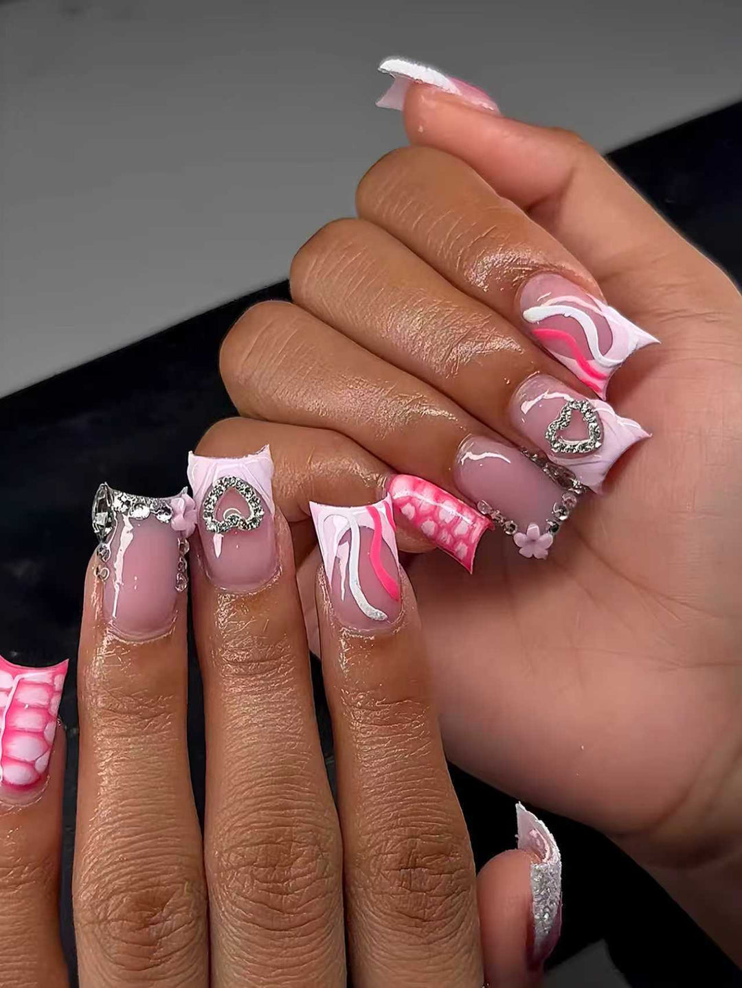 Artistic Heart-Embellished Nail Extensions Bowlift