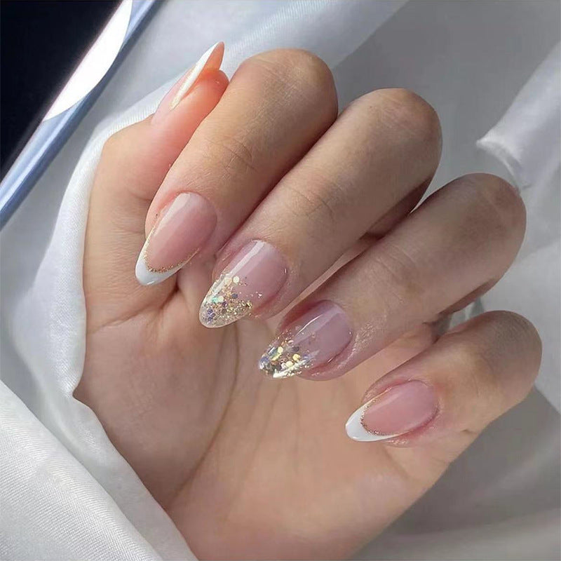 Elegant Stiletto Press-On Nail Set with Glitter and French Tip Bowlift