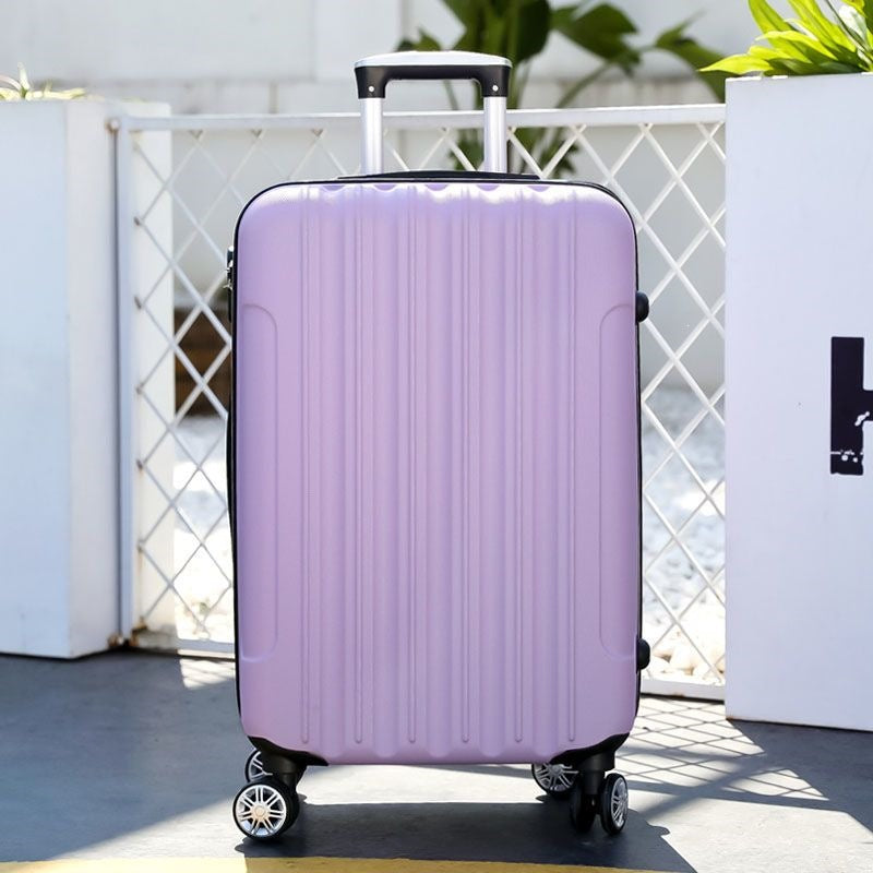 Hard shell suitcase with 360-degree wheel system and integrated safety feature Bowlift