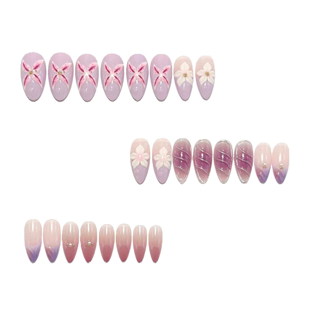 Artificial nails in elegant stiletto design with floral accent Bowlift