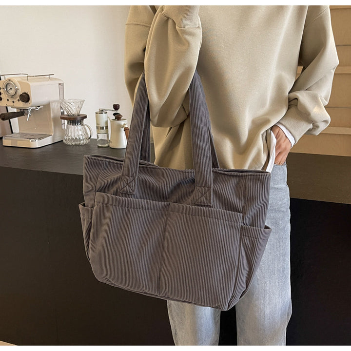 Multifunctional shoulder bag with large outer pockets Bowlift
