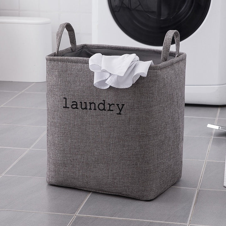 Laundry basket with practical carrying handle and modern design Bowlift
