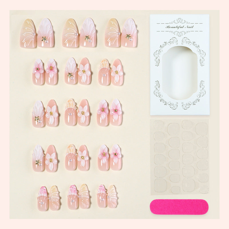 Acrylic nail set with luxuriously designed flower and glitter decorations Bowlift