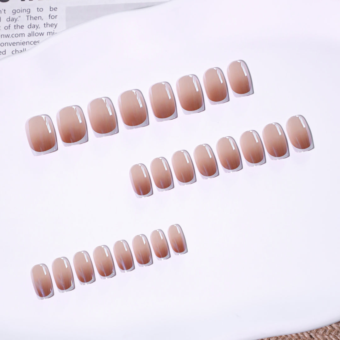 Artistic manicure with elegant French tip Bowlift