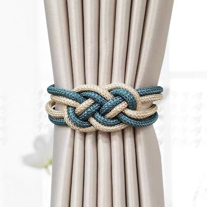 Decorative curtain tieback with braided design Bowlift