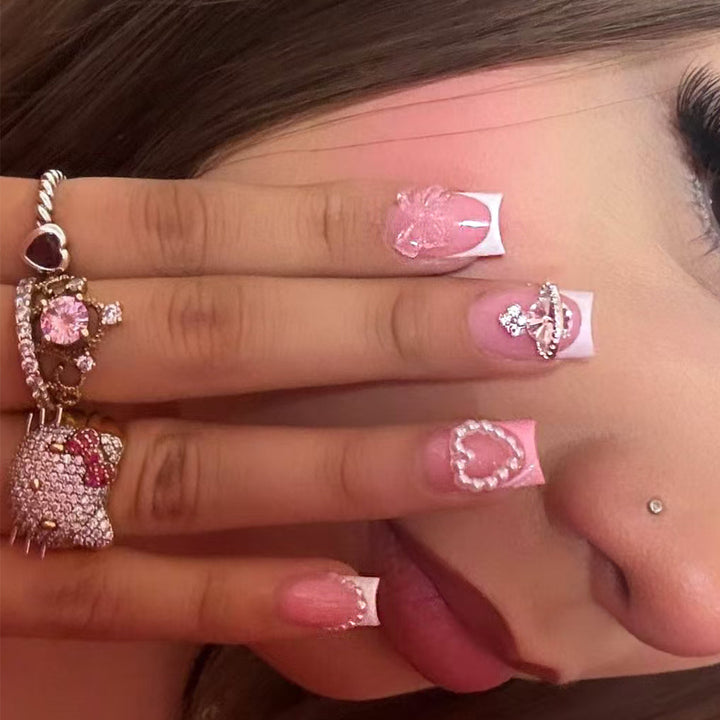 Artificial nails with romantic 3D applications Bowlift