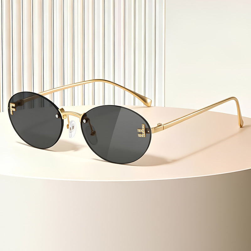 Sleek Metal Oval Sunglasses Bowlift