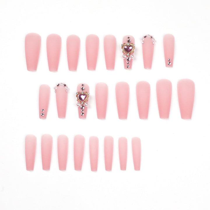Creative artificial nails with heart-shaped decorative accents Bowlift