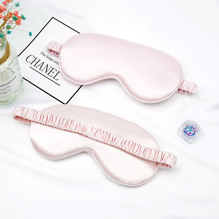 Women's breathable satin eye mask with ergonomic curvature, soft padding and gathered anti-slip band Bowlift