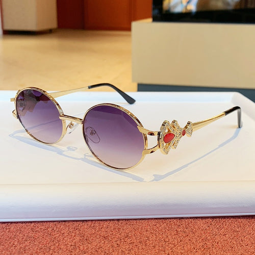 Ladies elegant rectangular sunglasses with glamorous embellishments Bowlift