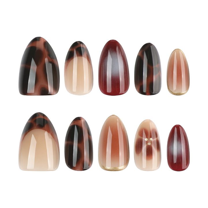 Glamorous acrylic stiletto nails with elegant glitter design Bowlift