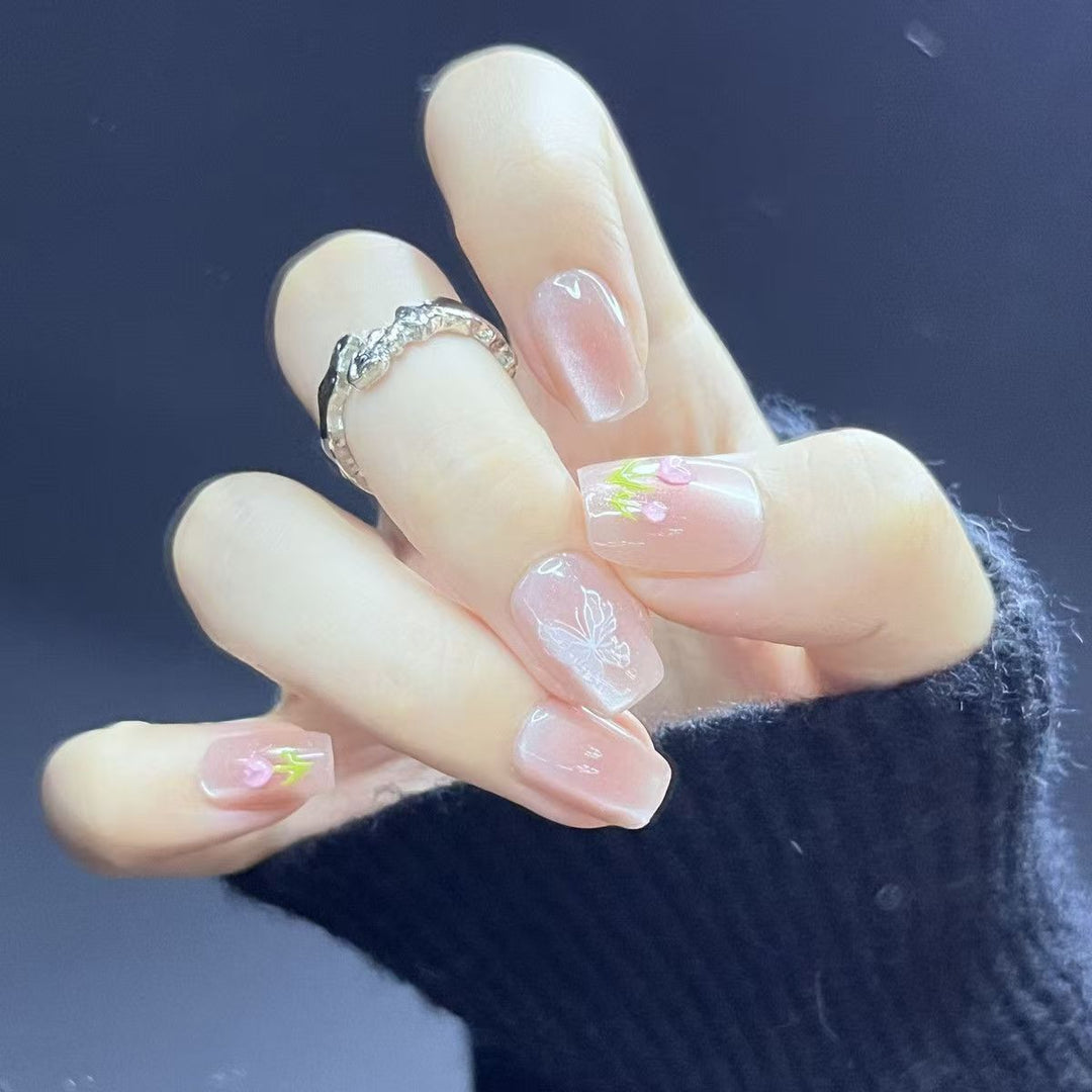 Artistic Press-On Nail Set with Floral and Glossy Accents Bowlift