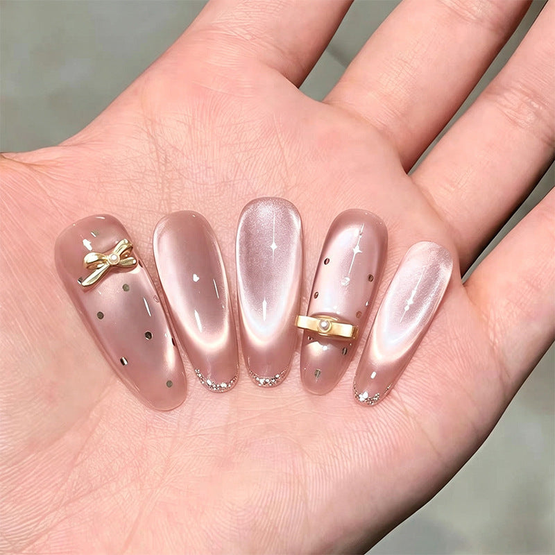Artificial nail set with sparkling glitter accents Bowlift
