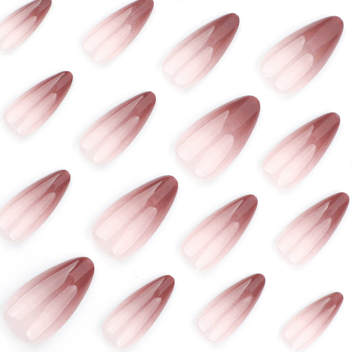 Artistic stiletto nails with elegant ombre design Bowlift