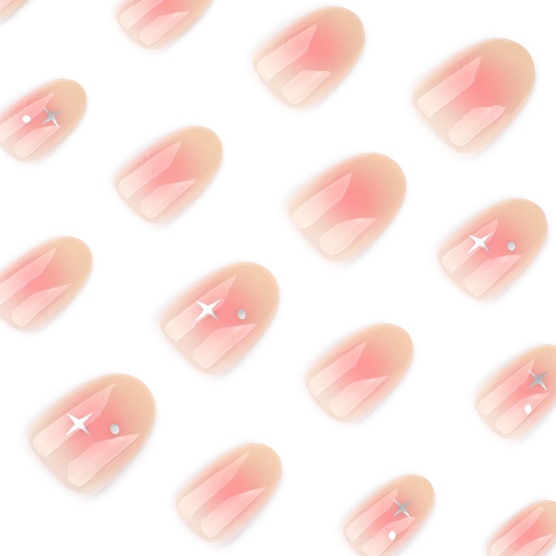 Artful nail extensions with shiny rhinestone accents Bowlift