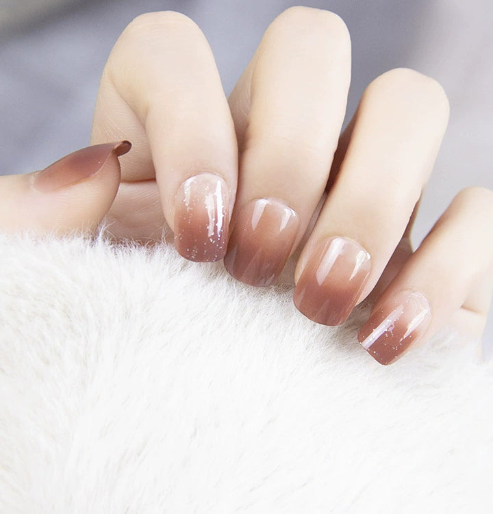Elegant nail design with pearl embellishment Bowlift