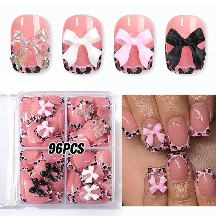 Artificial nail set with impressive floral and bow accents Bowlift