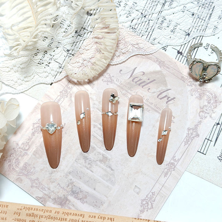 Acrylic nails with glamorous accents Bowlift