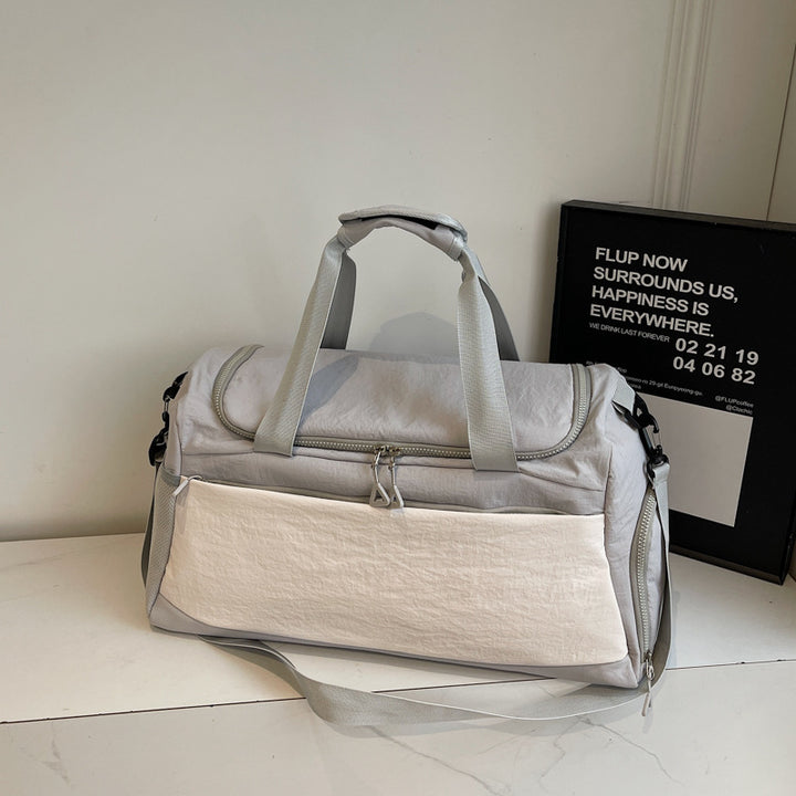 Sporty travel bag with multiple compartments Bowlift