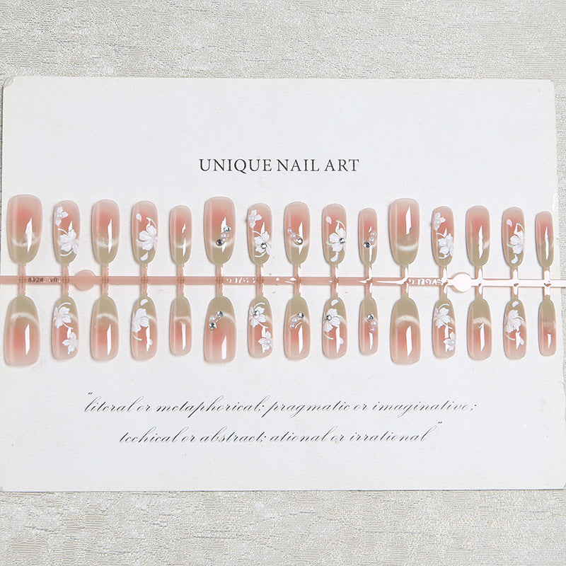 Artificial nail set with elegant floral accents Bowlift
