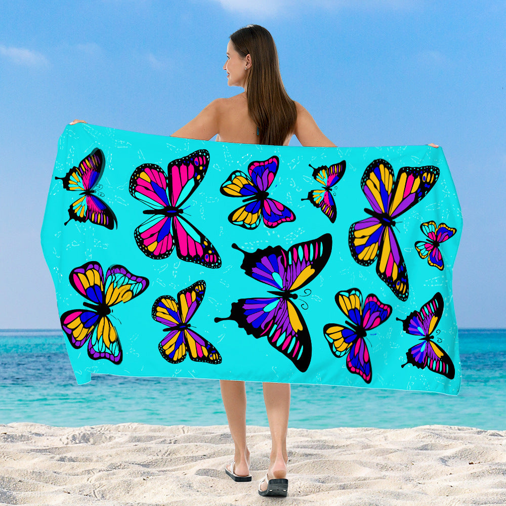 Beach towel with vibrant, colorful animal motif Bowlift
