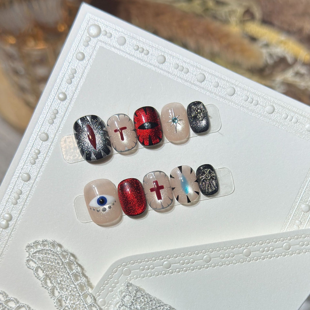 Artistic Press-On Nail Design Set with Unique Symbolic Accents Bowlift