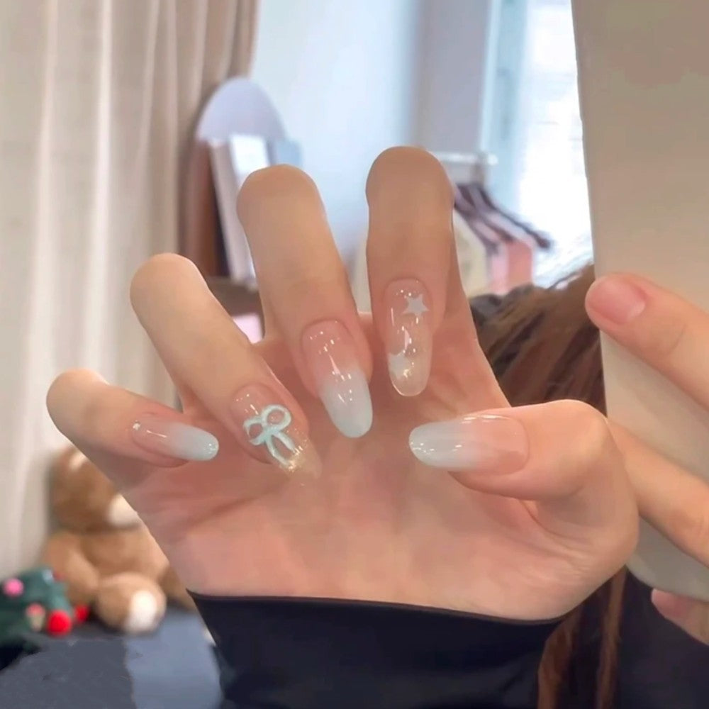 Artistic Press-On Nail Set with Glitter and Floral Accents Bowlift