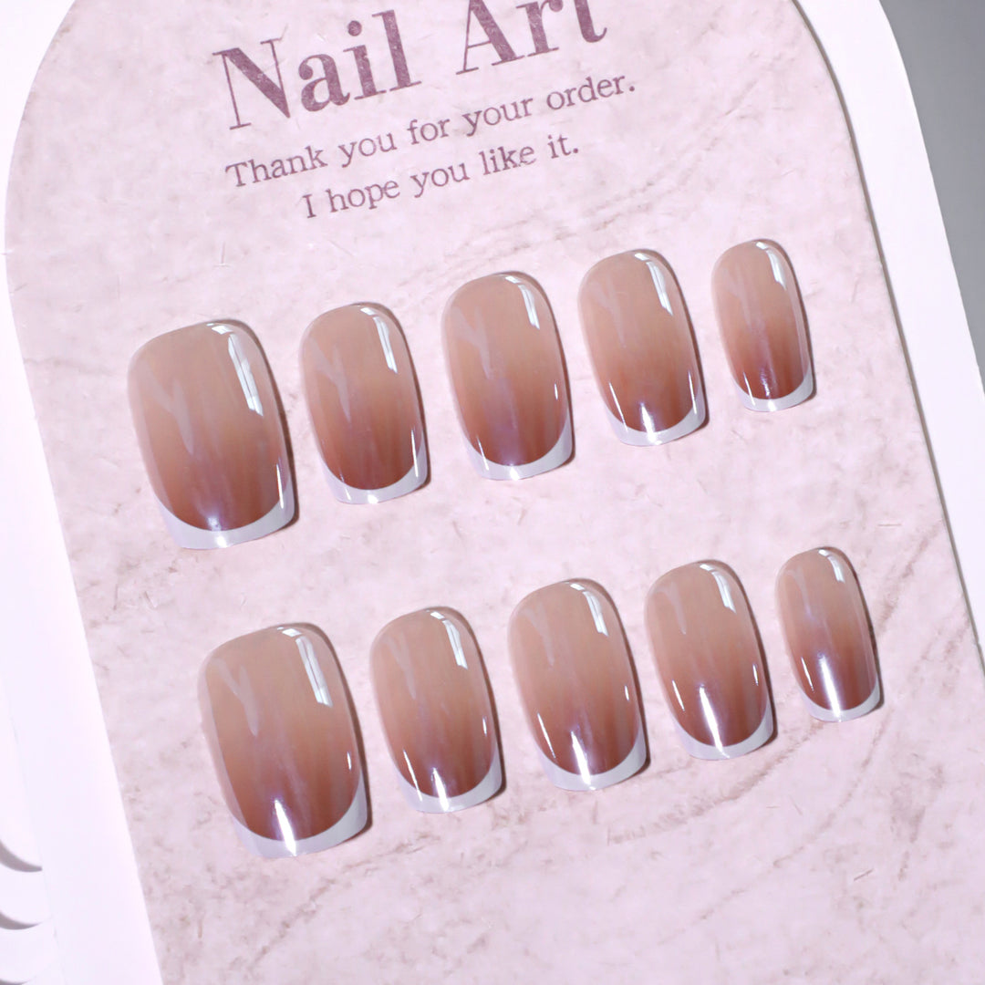Artistic manicure with elegant French tip Bowlift