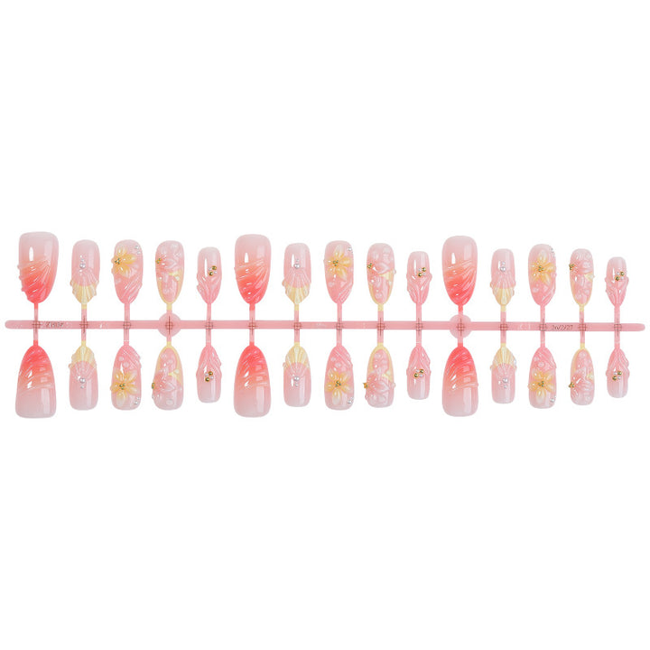 Artistic Floral Design Press-On Nails Set with Unique Embellishments Bowlift