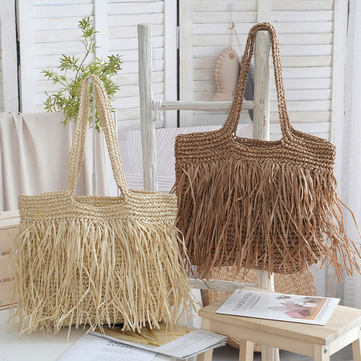 Trendy raffia bag with fringed details Bowlift