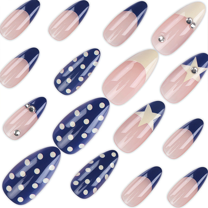 Artistic Nail Design with Star and Polka Dot Accents Bowlift