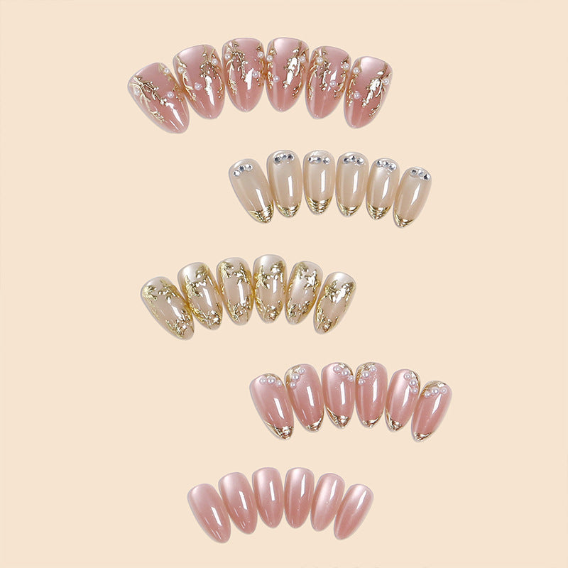 Artificial Nail Set with Elegant Gold Accent and Rhinestone Decorations Bowlift