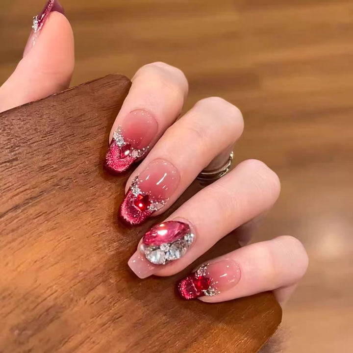 Artificial nails with elegant ombre effect and glitter coating Bowlift