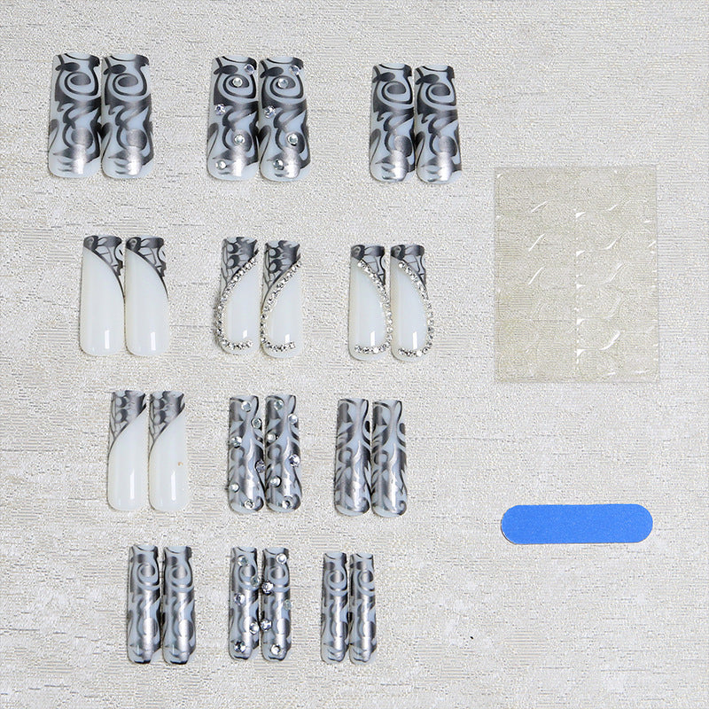 Elegant artificial nails with stylish embellishments Bowlift