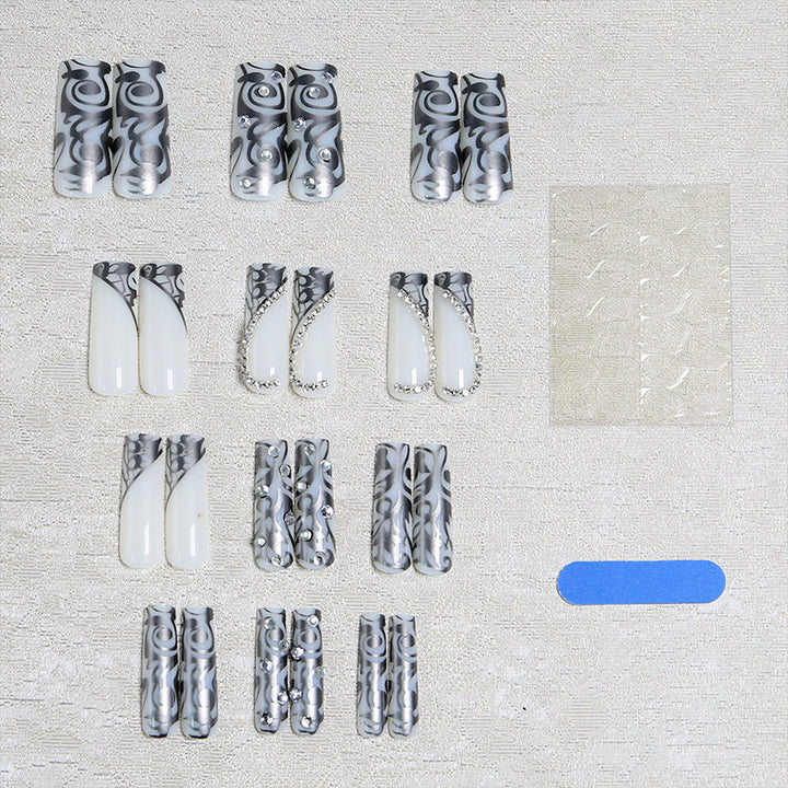 Elegant artificial nails with stylish embellishments Bowlift