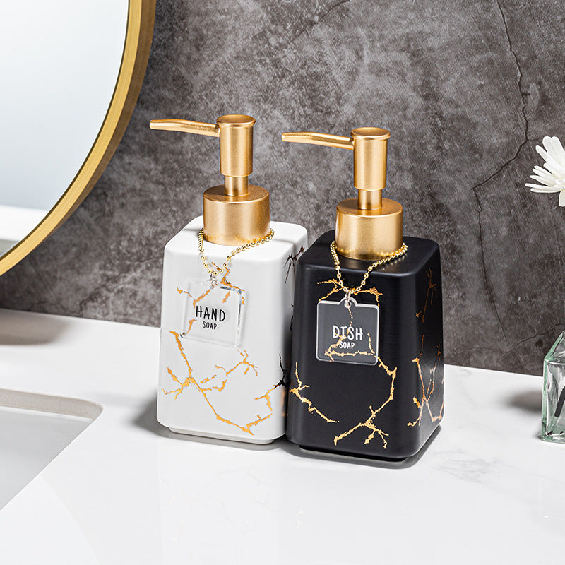 Luxury marble-effect ceramic soap dispenser with gold pump Bowlift