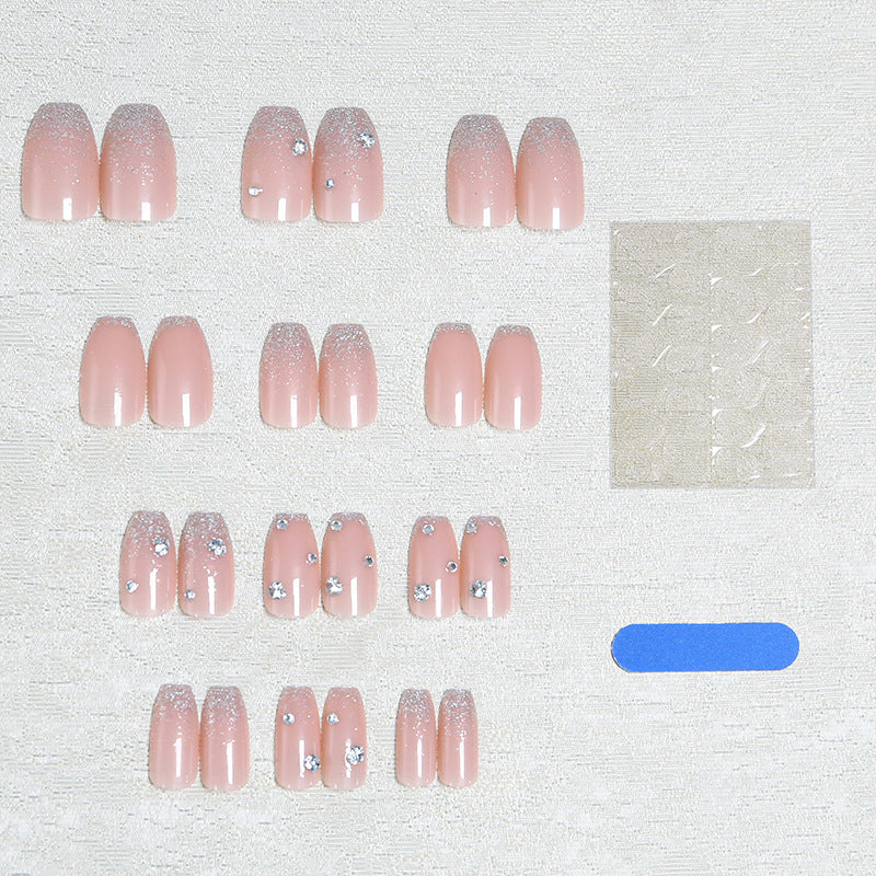 Acrylic nail set with extravagant glitter and crystal embellishments Bowlift