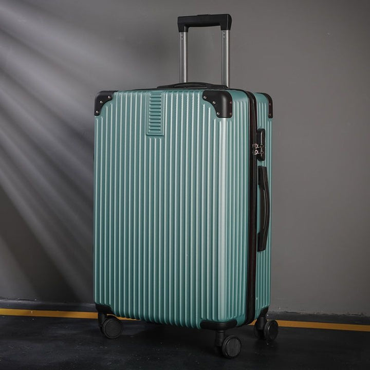 Hard shell suitcase with 360-degree wheel system and integrated safety feature Bowlift