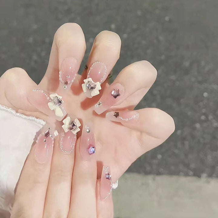 Artificial nails with floral accents Bowlift