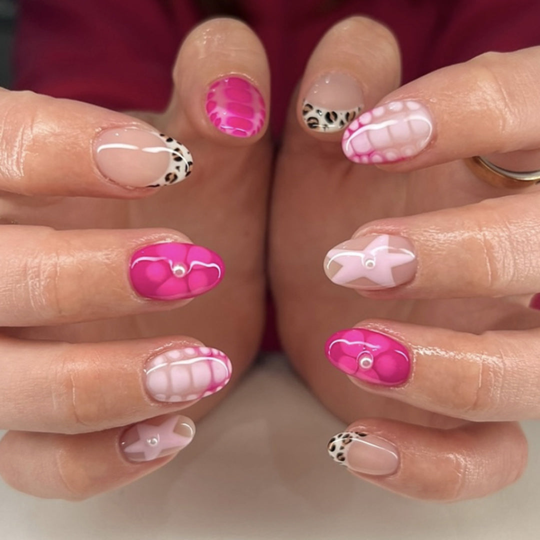 Artful nail art with colorful design and glitter accents Bowlift